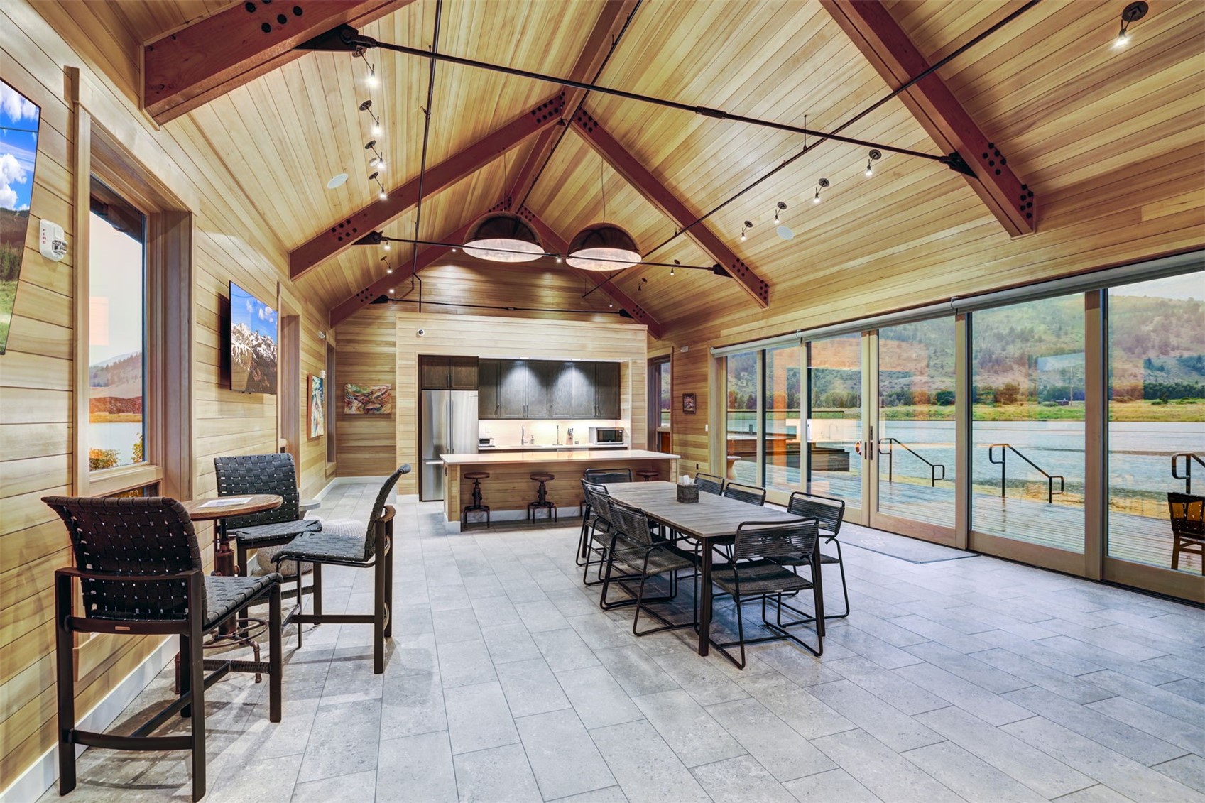 21 Moss Way Silverthorne, CO 80498 - Photo 42 of 50 a dining room with furniture and a floor to ceiling window