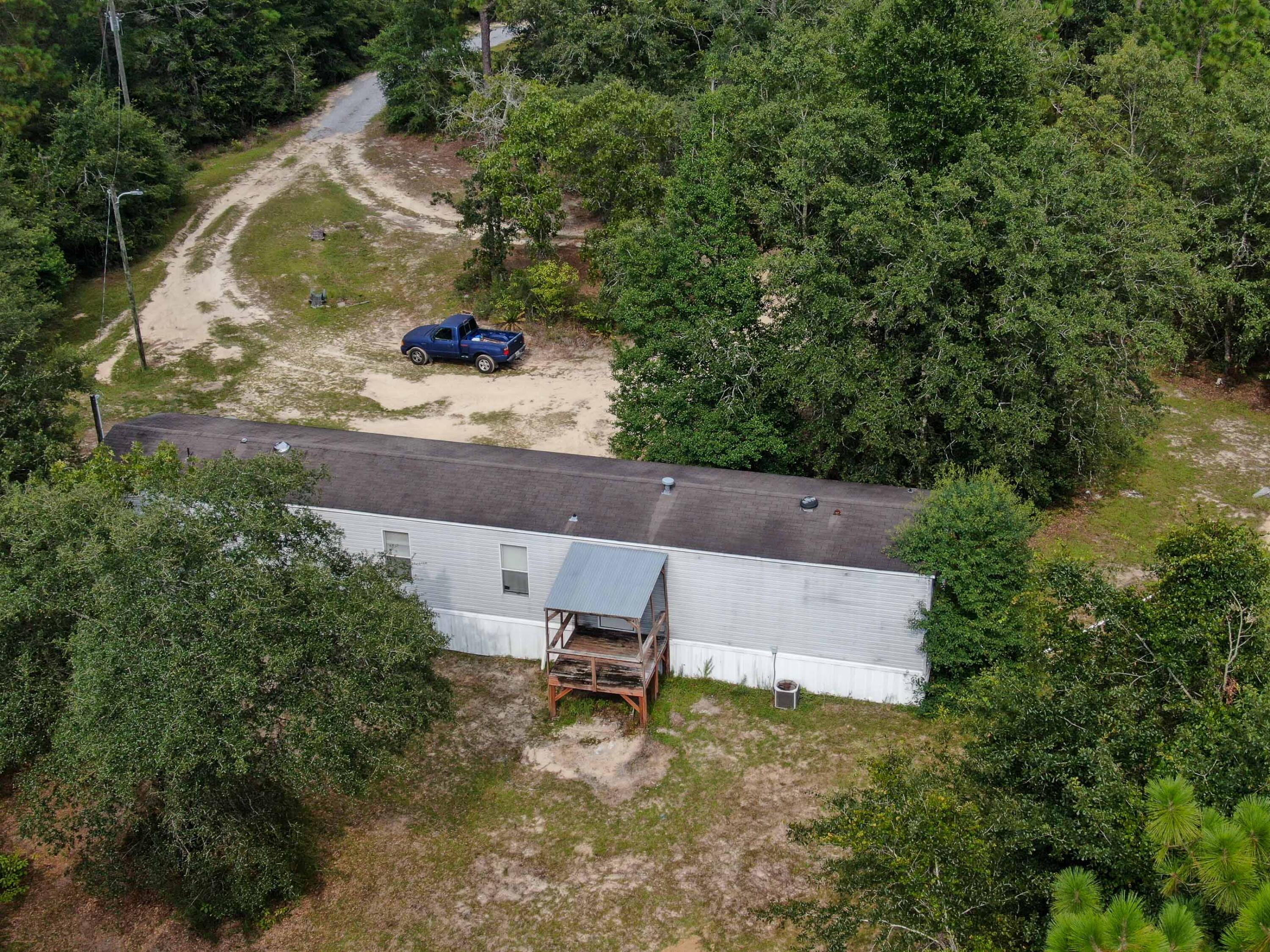 3229 King Lake Road DeFuniak Springs, FL 32433 - Photo 8 of 11 an aerial view of a house with outdoor space