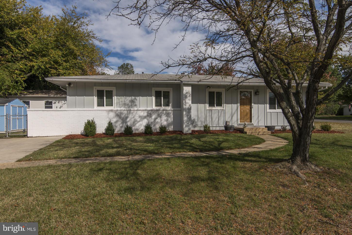6203 Apache Street Springfield, VA 22150 - Photo 1 of 22 a view of a house with a yard