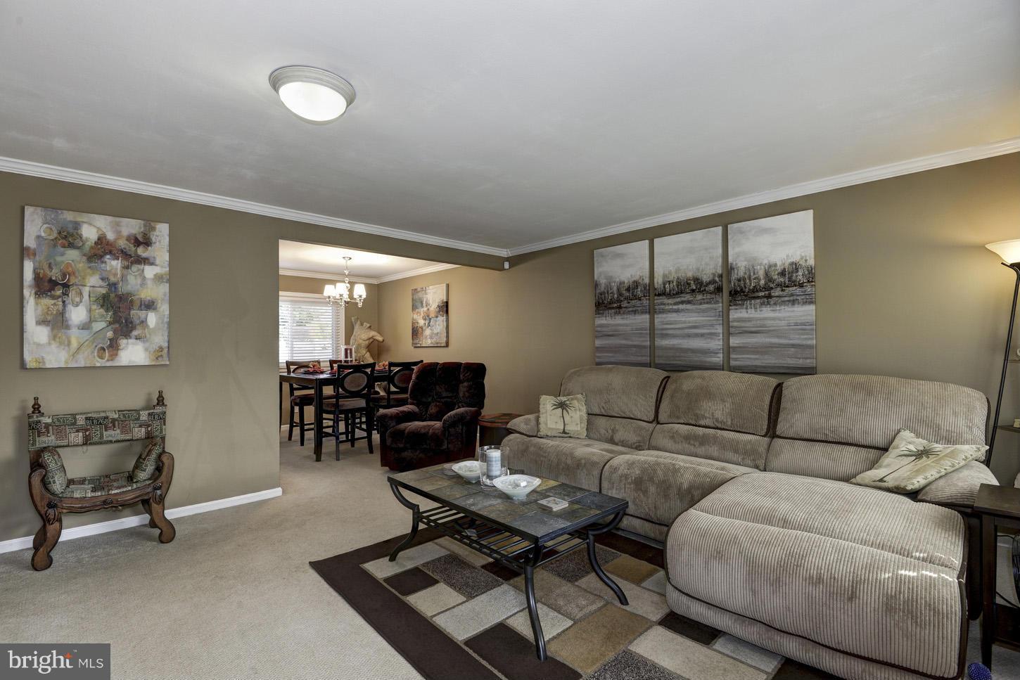 6203 Apache Street Springfield, VA 22150 - Photo 3 of 22 a living room with furniture and rug