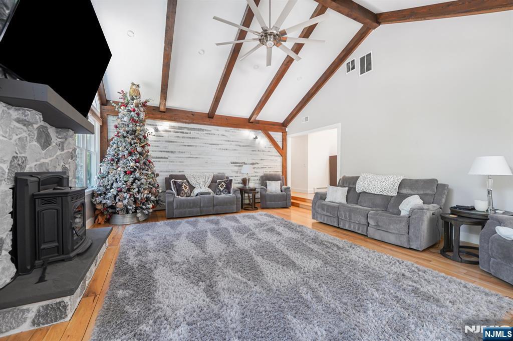 26 Danville Mountain Road Great Meadows, NJ 07838 - Photo 13 of 49 a living room with furniture a fireplace and a flat screen tv