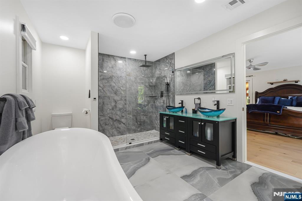 26 Danville Mountain Road Great Meadows, NJ 07838 - Photo 26 of 49 a spacious bathroom with a tub sink and mirror