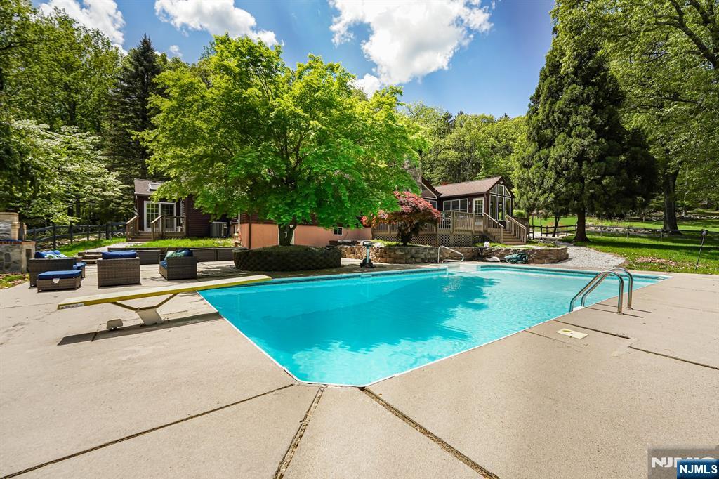 26 Danville Mountain Road Great Meadows, NJ 07838 - Photo 3 of 49 a view of a swimming pool with a patio