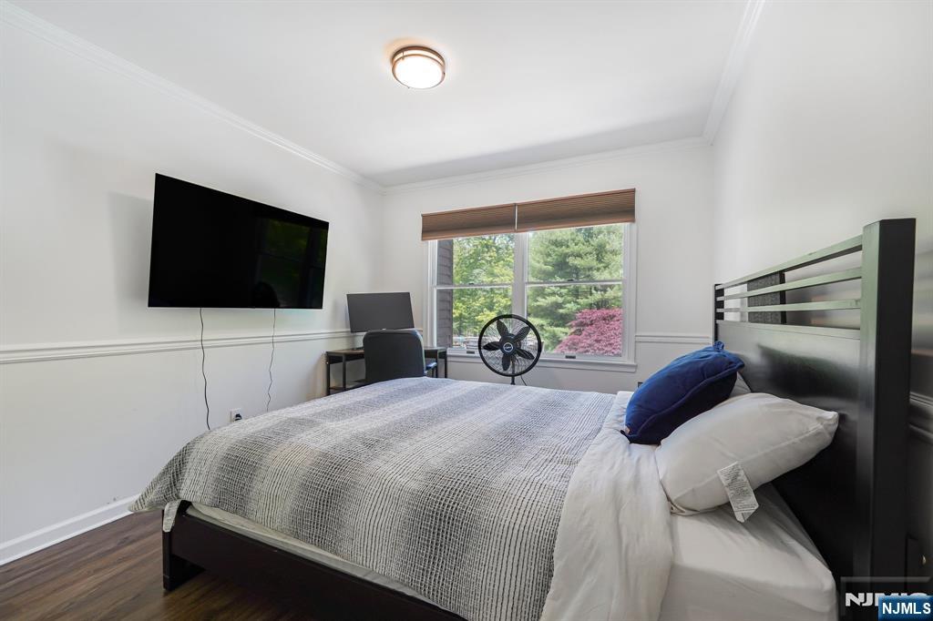 26 Danville Mountain Road Great Meadows, NJ 07838 - Photo 33 of 49 a bedroom with a bed and a flat tv screen on the dresser