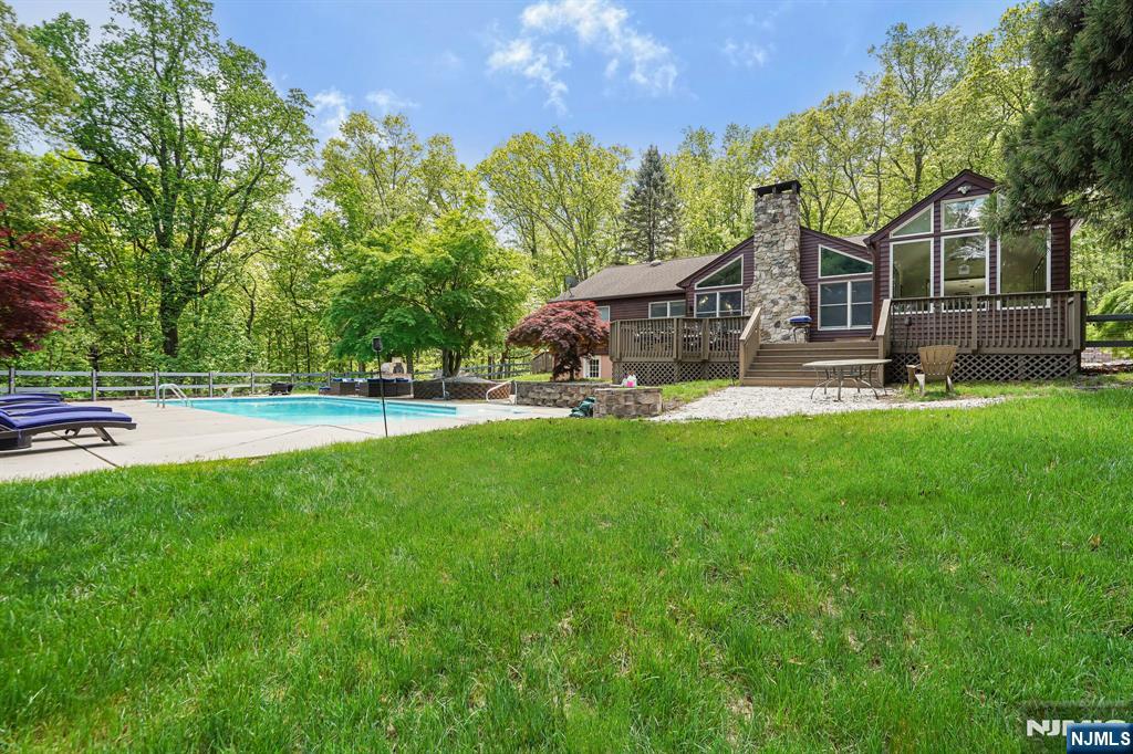 26 Danville Mountain Road Great Meadows, NJ 07838 - Photo 44 of 49 a house view with a sitting space and garden