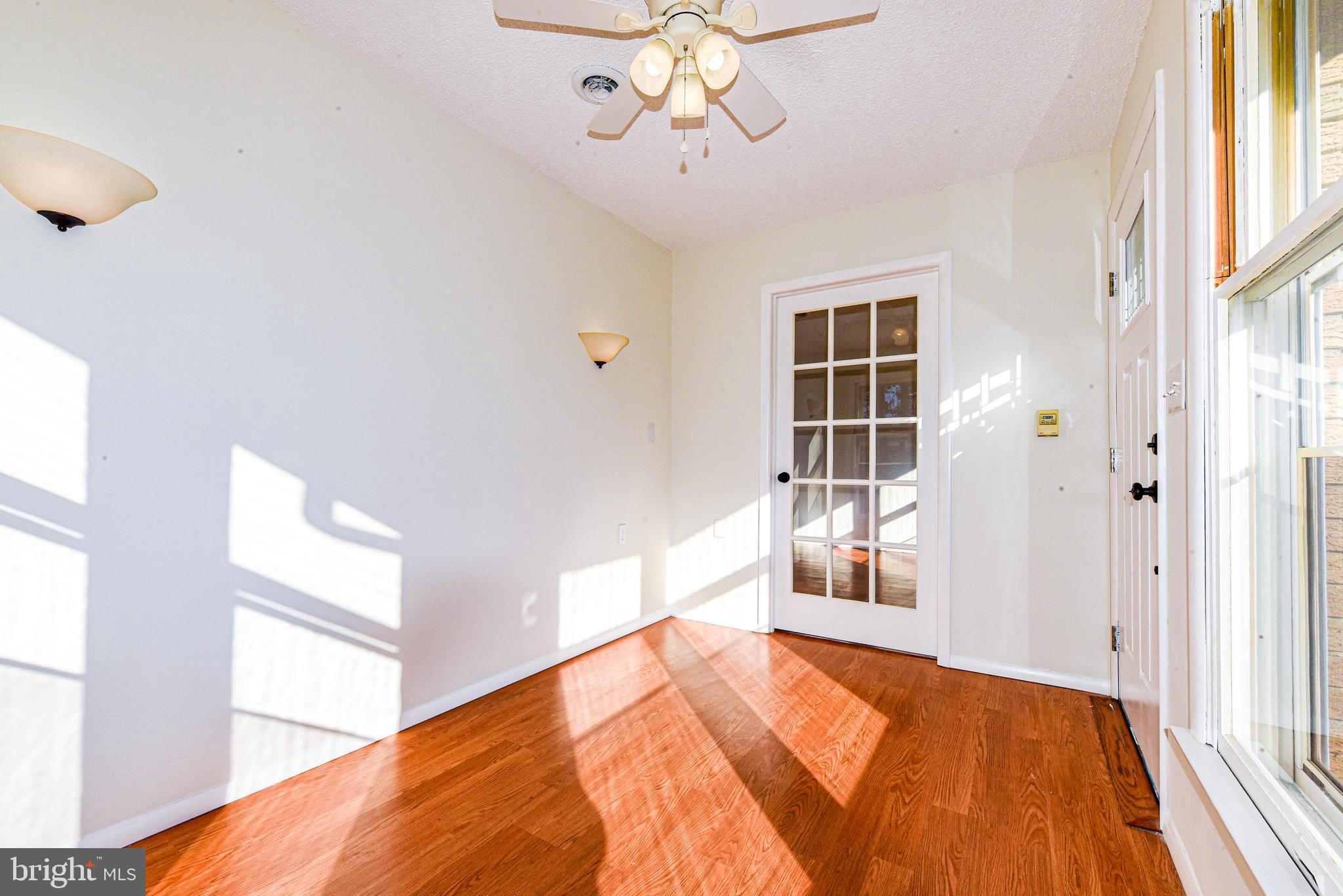 18 B Acorn Road Manahawkin, NJ 08050 - Photo 3 of 19 a bedroom with a bed and a window