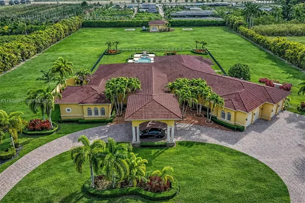 an aerial view of a house with a garden