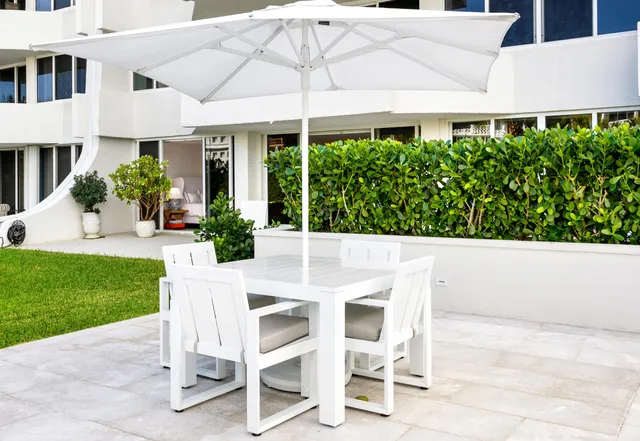 a view of a swimming pool with a terrace