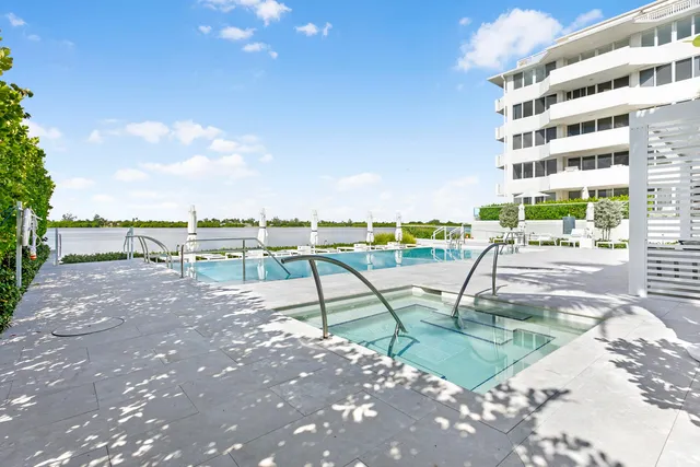 a kitchen with stainless steel appliances and cabinets