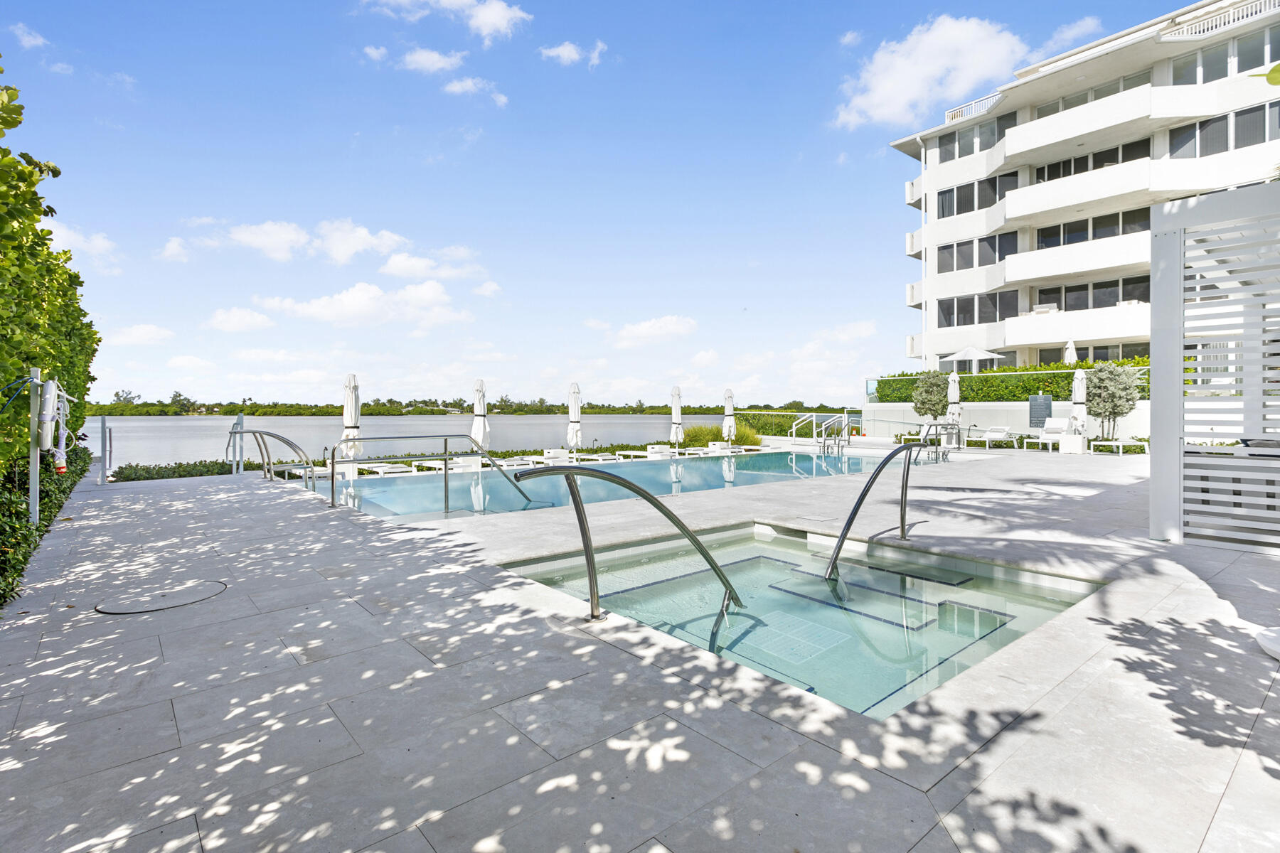 2773 South Ocean Boulevard, Unit 109 Palm Beach, FL 33480 - Photo 25 of 36 a view of a swimming pool with a terrace