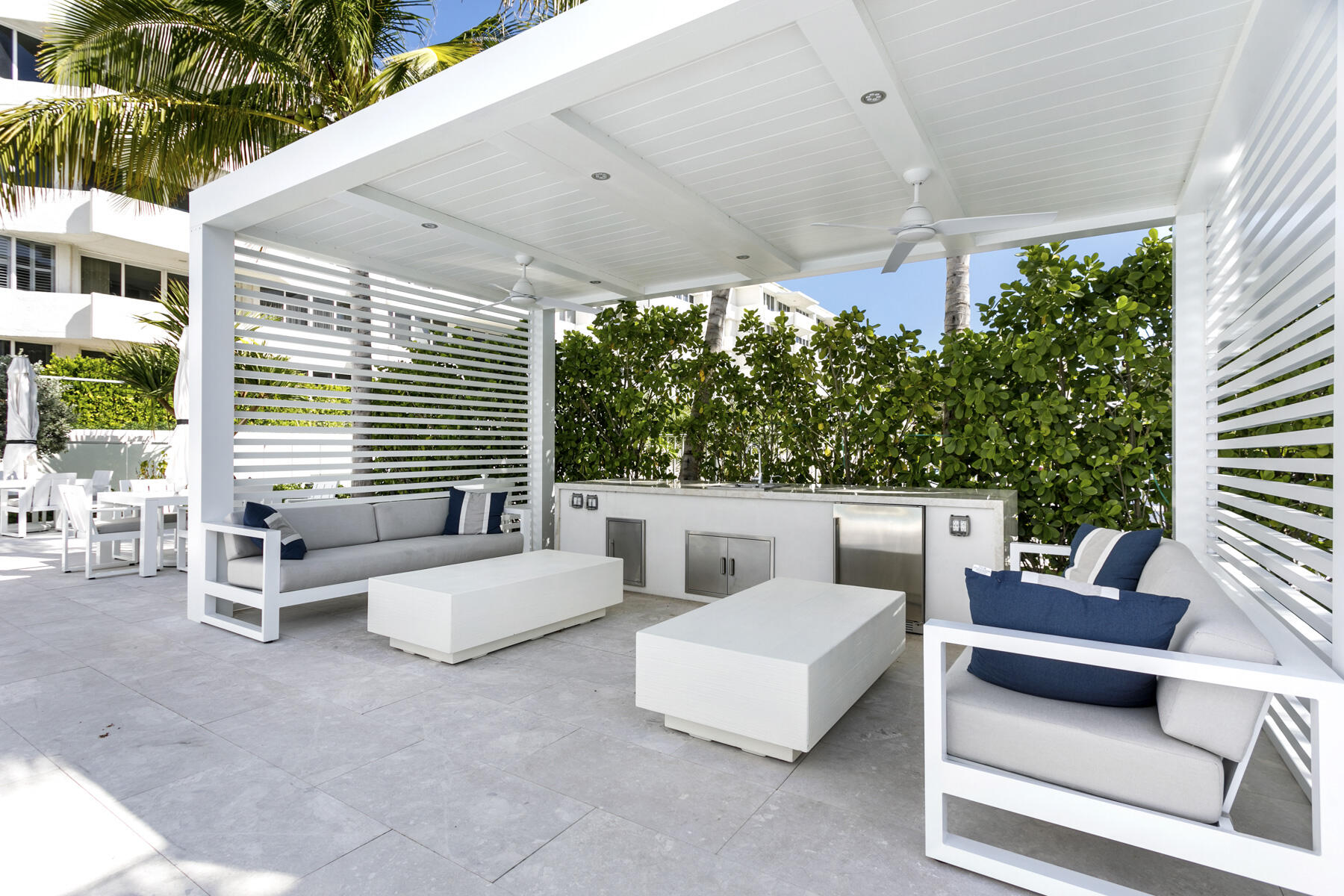 2773 South Ocean Boulevard, Unit 109 Palm Beach, FL 33480 - Photo 27 of 36 a balcony with furniture and a potted plant