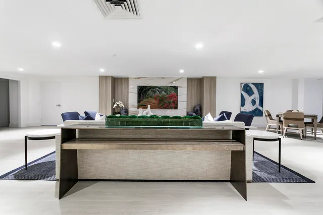 a outdoor living space with furniture and a rug