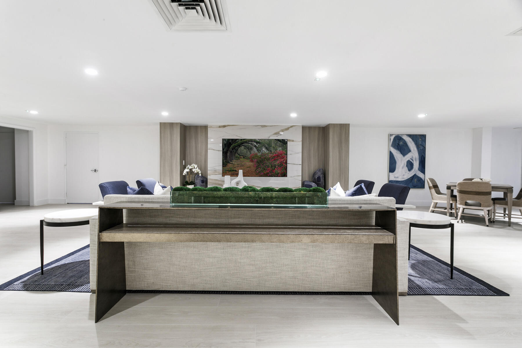 2773 South Ocean Boulevard, Unit 109 Palm Beach, FL 33480 - Photo 29 of 36 a living room with furniture a wooden floor and potted plant