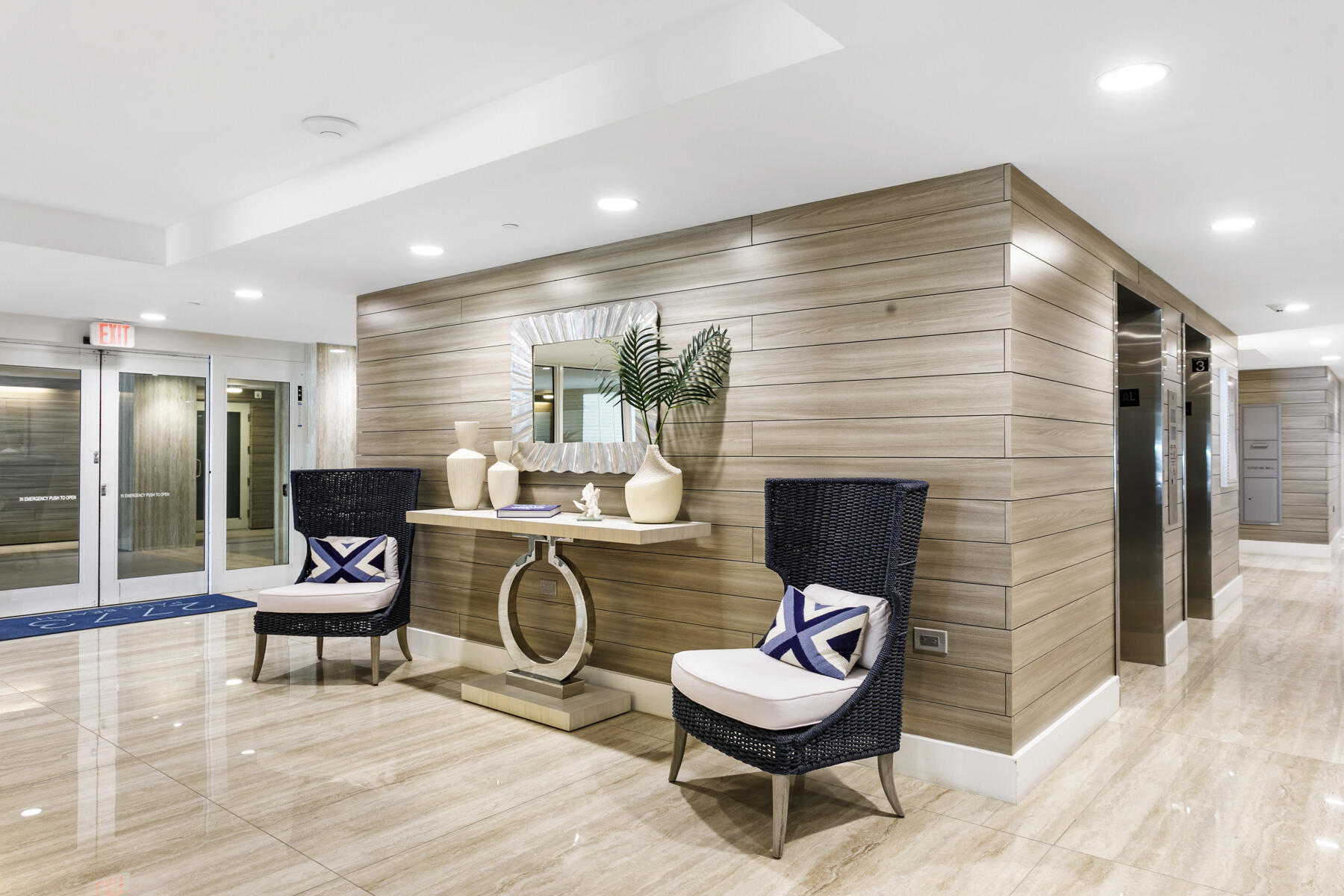 2773 South Ocean Boulevard, Unit 109 Palm Beach, FL 33480 - Photo 33 of 36 a living room with furniture and a fireplace