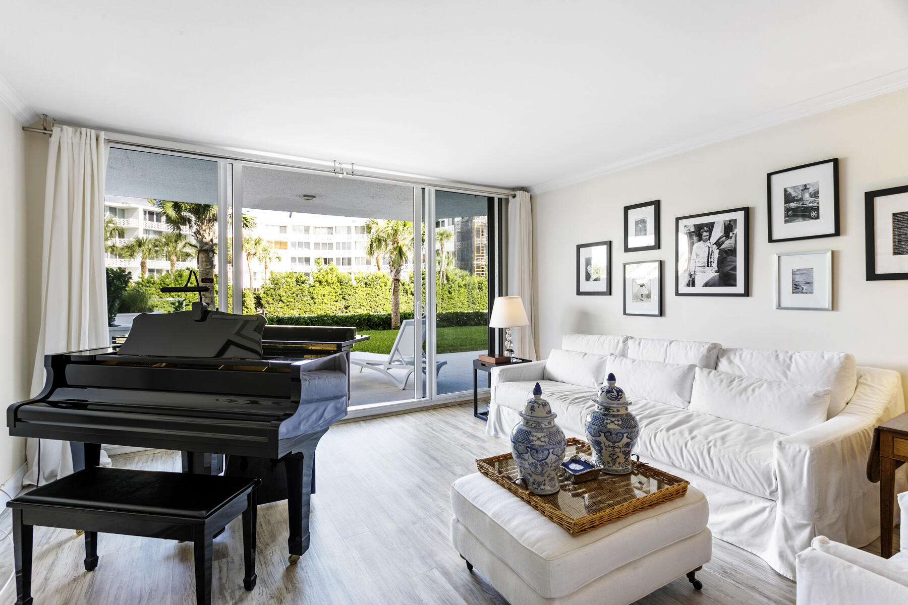 2773 South Ocean Boulevard, Unit 109 Palm Beach, FL 33480 - Photo 6 of 36 a living room with furniture and a large window