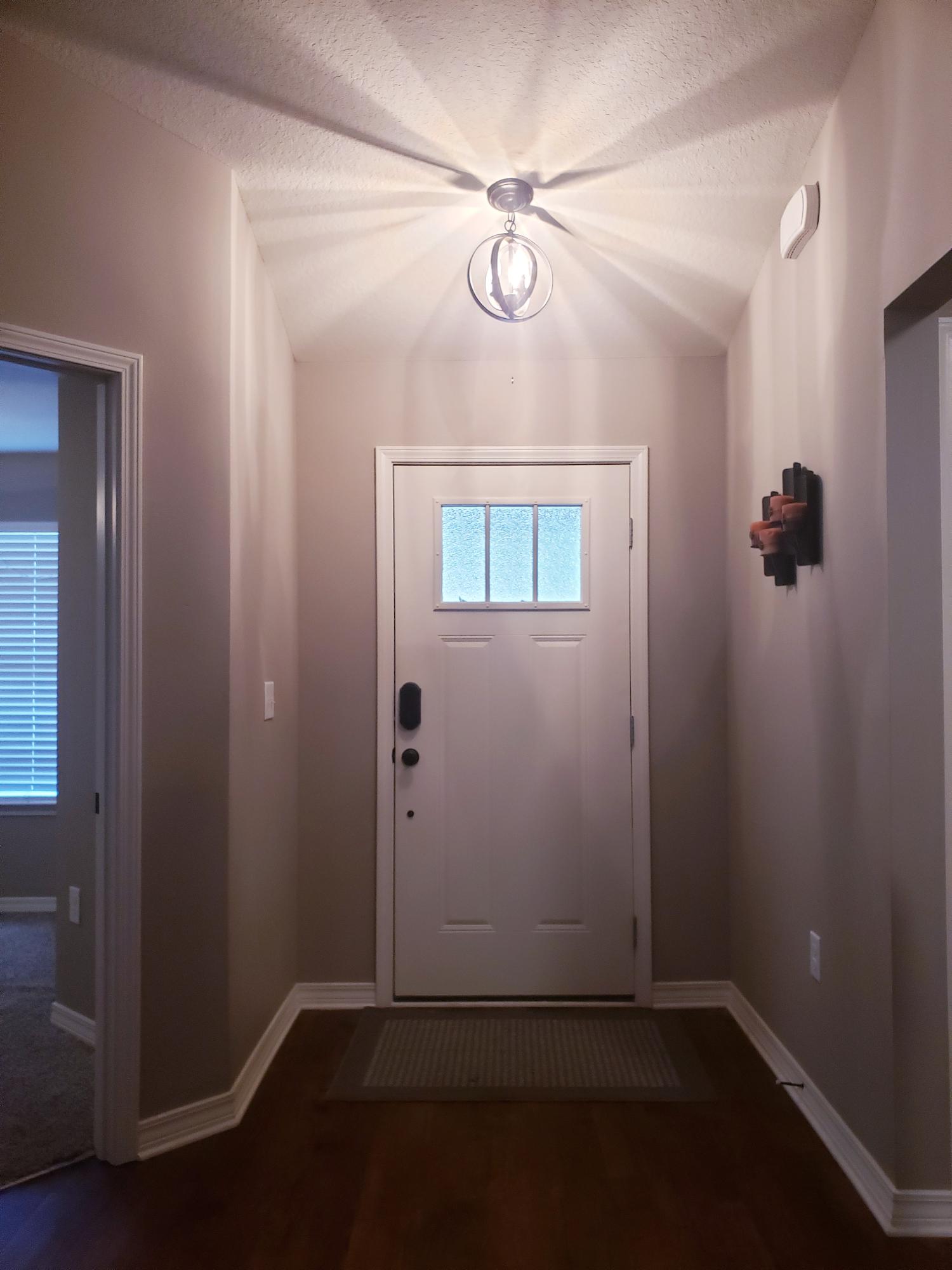 961 Valley Road Crestview, FL 32539 - Photo 3 of 3 an empty room with windows and fan