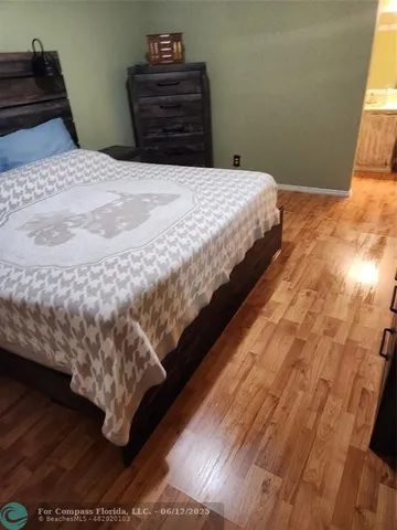 a view of a bathroom from a hallway