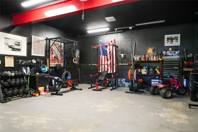 a view of a garage with gym equipment