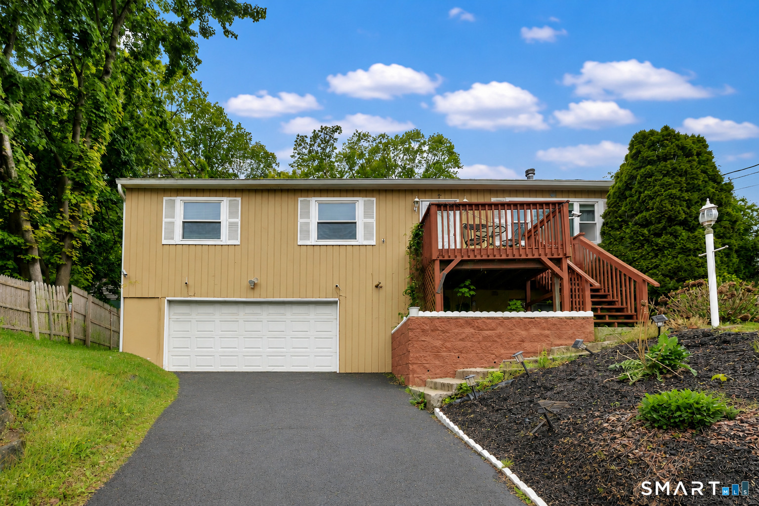 123 River Road Shelton, CT 06484 - Photo 1 of 27 a front view of a house with a yard and garage
