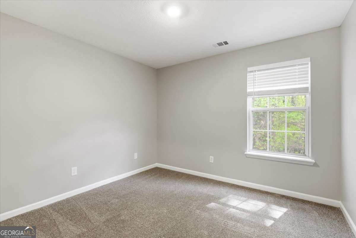 4634 Noah Valley Acworth, GA 30101 - Photo 18 of 27 an empty room with a window