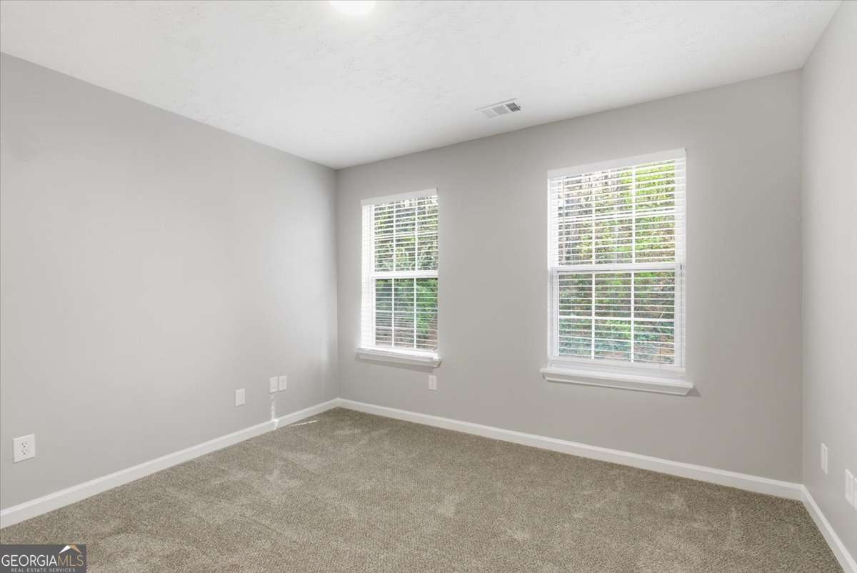 4634 Noah Valley Acworth, GA 30101 - Photo 19 of 27 an empty room with a window