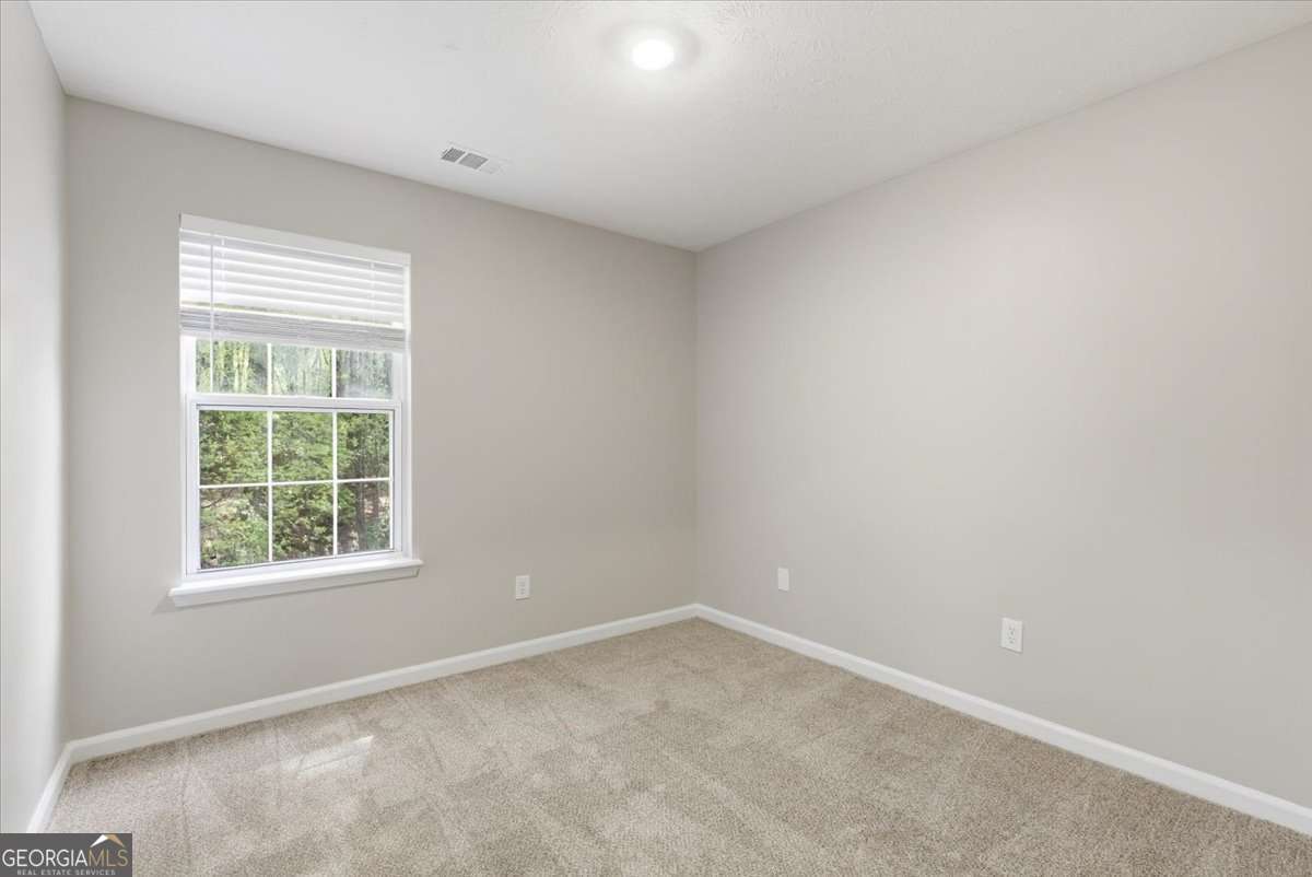 4634 Noah Valley Acworth, GA 30101 - Photo 20 of 27 an empty room with a window