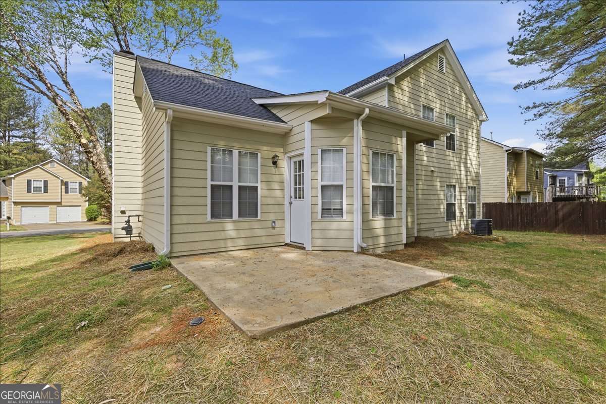 4634 Noah Valley Acworth, GA 30101 - Photo 24 of 27 a view of a house with a yard