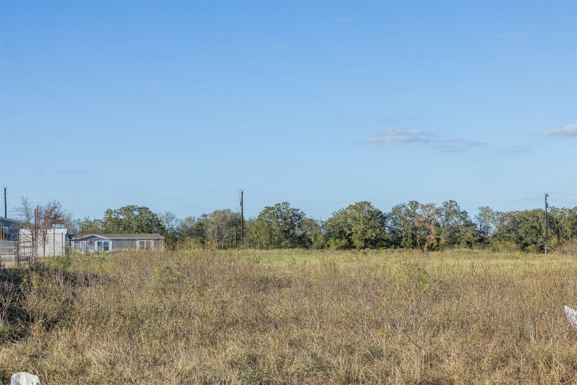 175 Romberg Road Dale, TX 78616 - Photo 3 of 6 a view of a lake with houses in the back