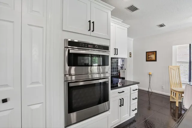 a workspace with furniture and window