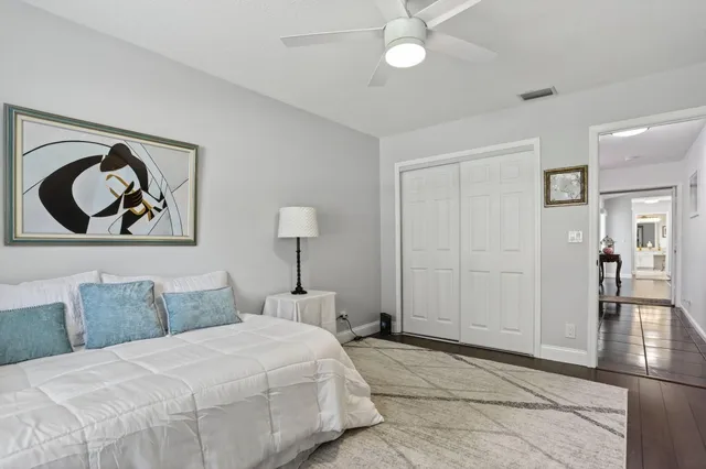 a spacious bathroom with a double vanity sink and a mirror