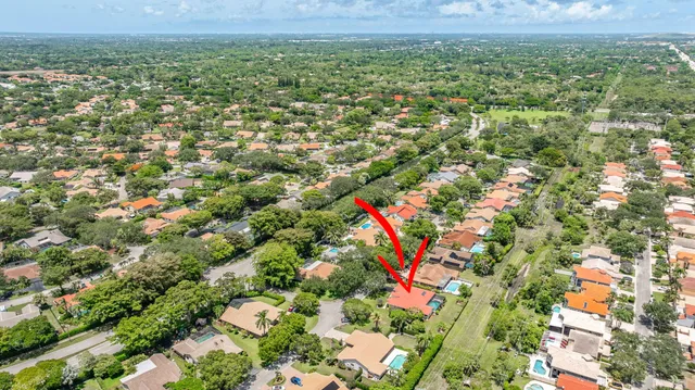 a view of outdoor space with playground and green space