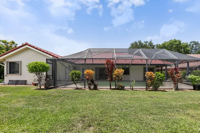 a view of a green field with clear sky