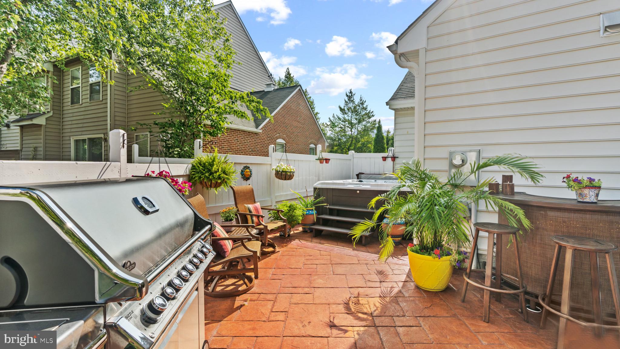 12083 Edgemere Circle Reston, VA 20190 - Photo 26 of 32 Wrap around patio with hot tub.