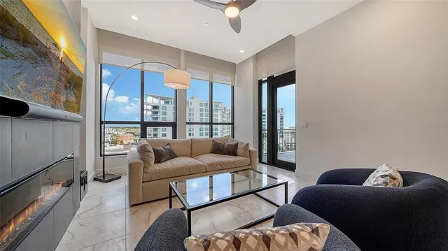 a living room with furniture and a window