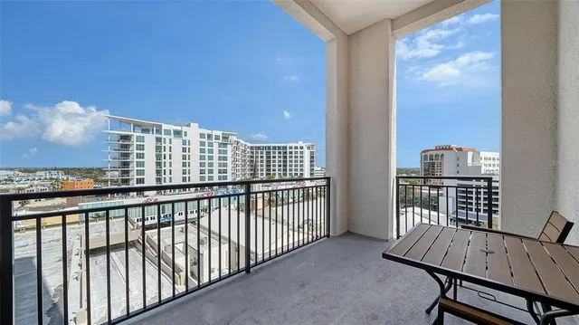 a view of balcony with furniture