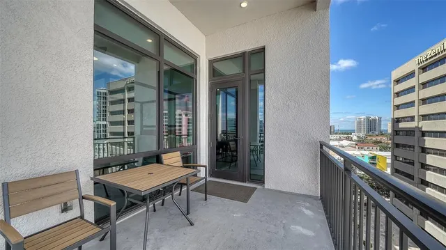 a room with a table and chairs