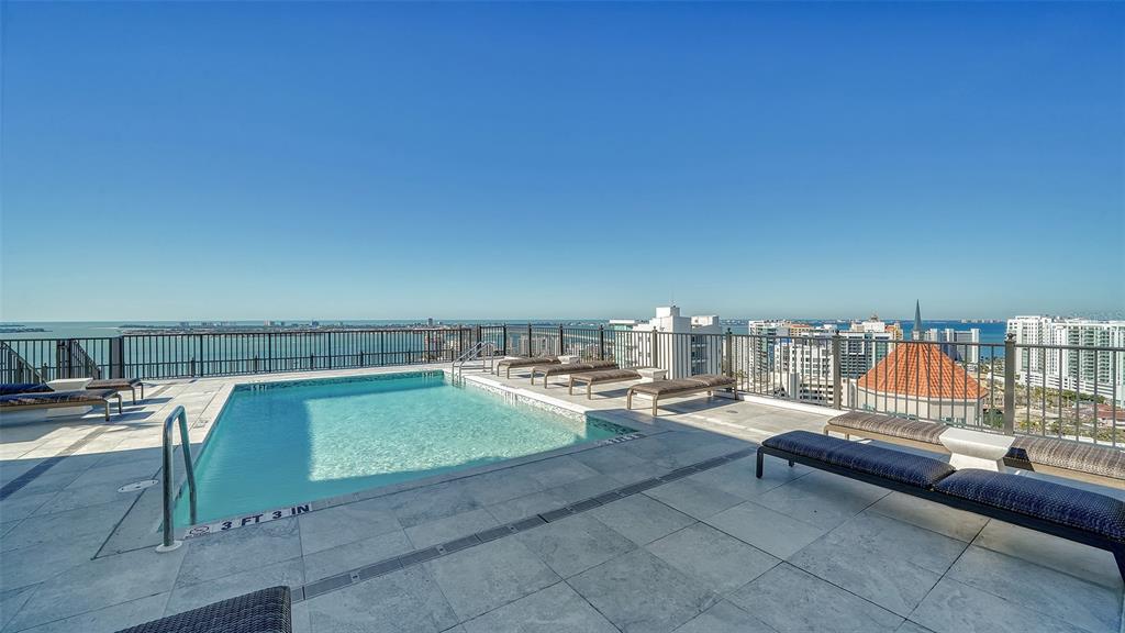 33 South Palm Avenue, Unit 804 Sarasota, FL 34236 - Photo 26 of 42 a terrace with outdoor seating and city view