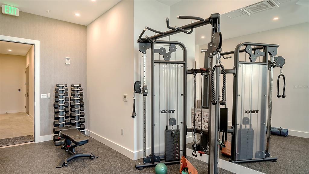 33 South Palm Avenue, Unit 804 Sarasota, FL 34236 - Photo 33 of 42 a view of a hallway with windows and closet