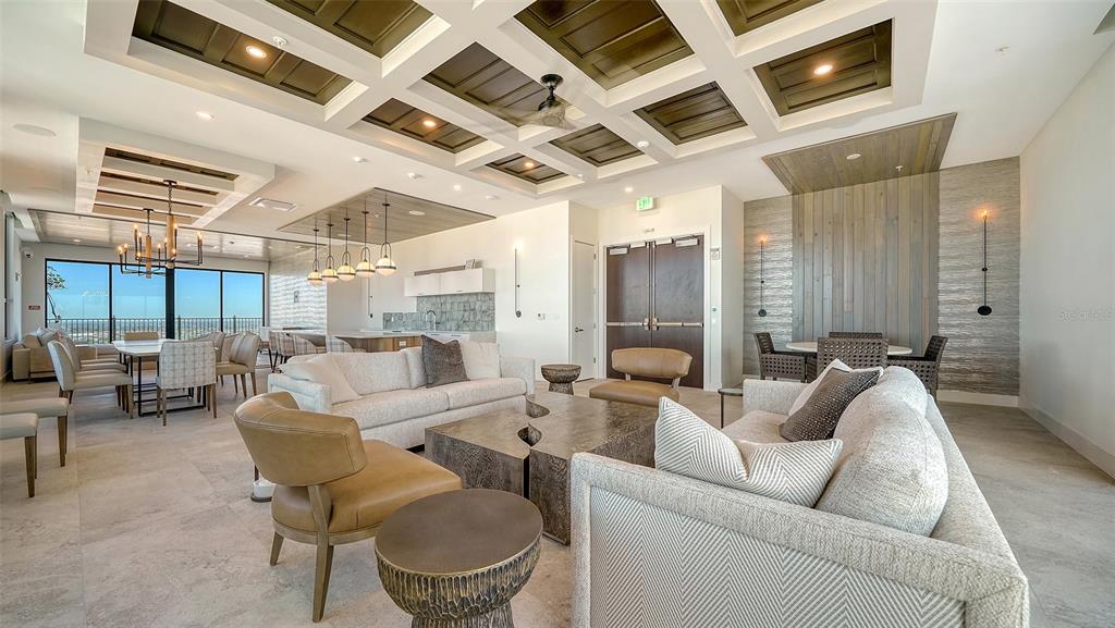 33 South Palm Avenue, Unit 804 Sarasota, FL 34236 - Photo 34 of 42 a living room with furniture and a fireplace