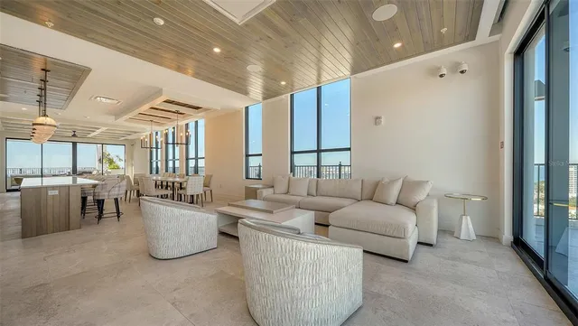 a living room with furniture and a table