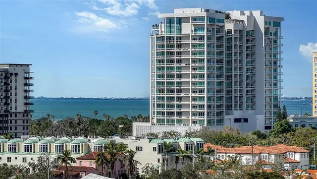 a view of a balcony with chairs