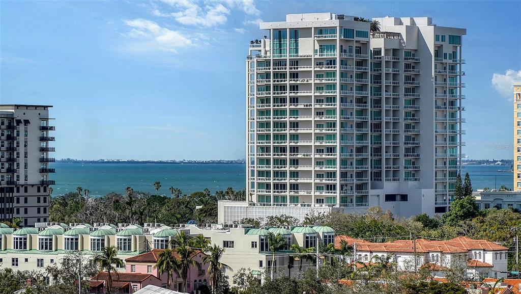 33 South Palm Avenue, Unit 804 Sarasota, FL 34236 - Photo 38 of 42 a view of a balcony with chairs