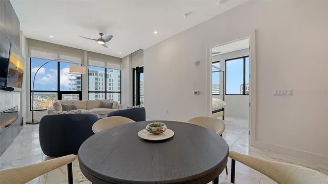 a view of a dining room with furniture