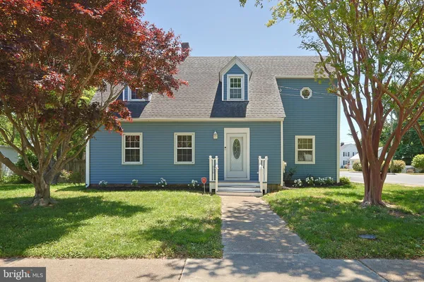 front view of a house and a yard