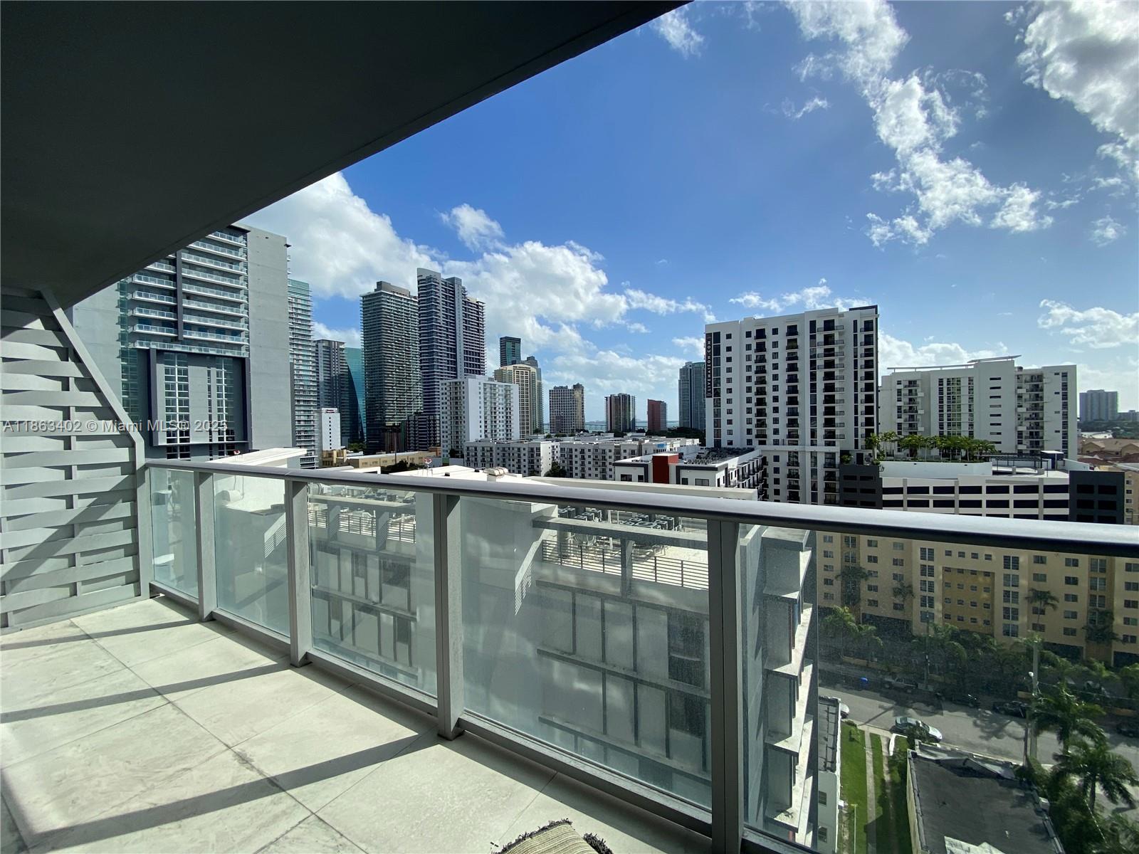 1010 Southwest 2nd Avenue, Unit 1110 Miami, FL 33130 - Photo 1 of 18 a view of a balcony with city view