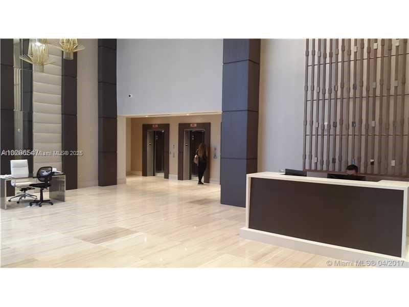 1010 Southwest 2nd Avenue, Unit 1110 Miami, FL 33130 - Photo 17 of 18 a living room with furniture