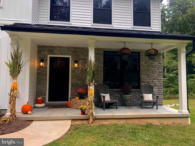 a front view of a house with patio