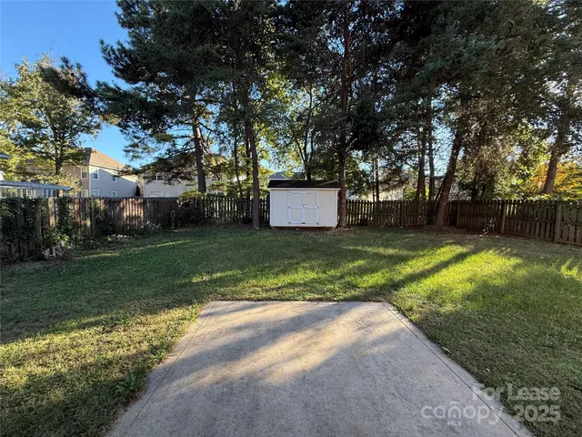 a view of a backyard with a garden