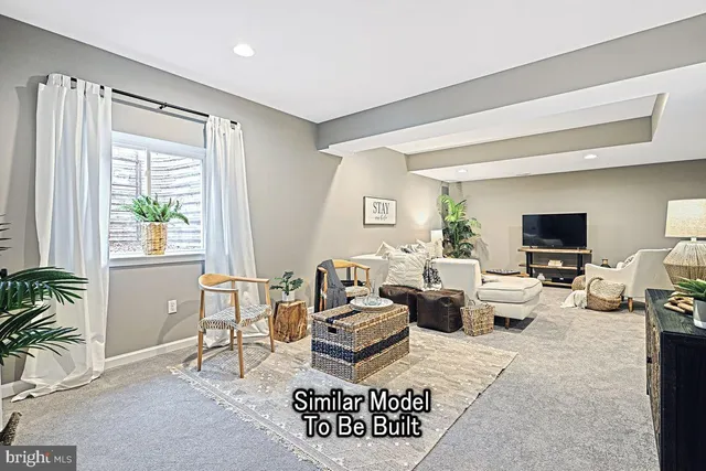 a living room with furniture or couch and a window