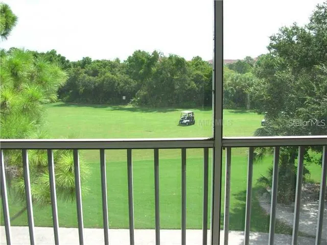 a view of a patio with swimming pool